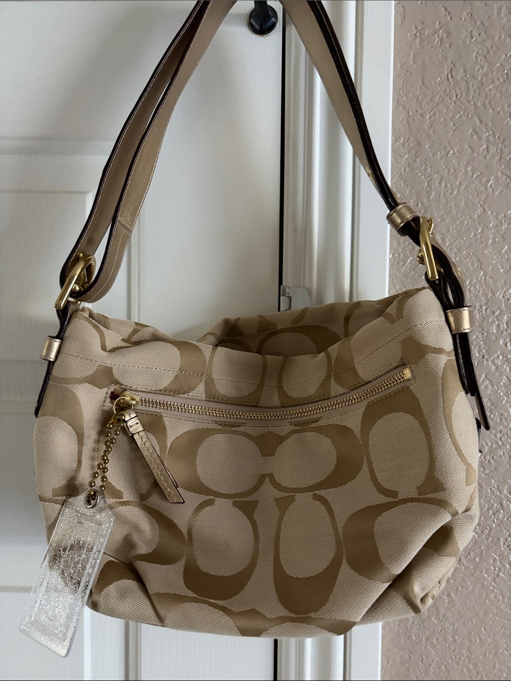 Coach Signature Canvas Hobo in Beige and Tan with Gold Hardware